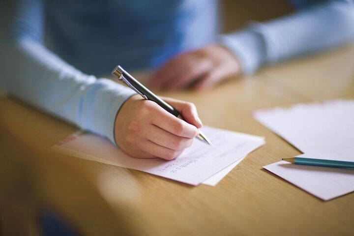 young woman_writing_letter